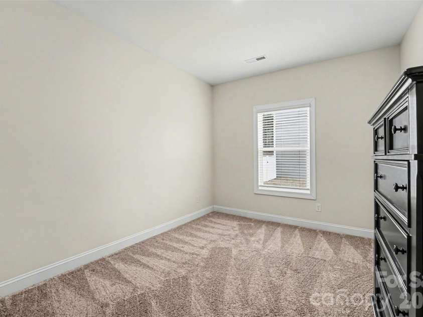 115 Tradesmen Trail, Troutman, NC 28166.  MLS# CAR4350971, YatesRealty ID 17825. Spacious secondary BR3