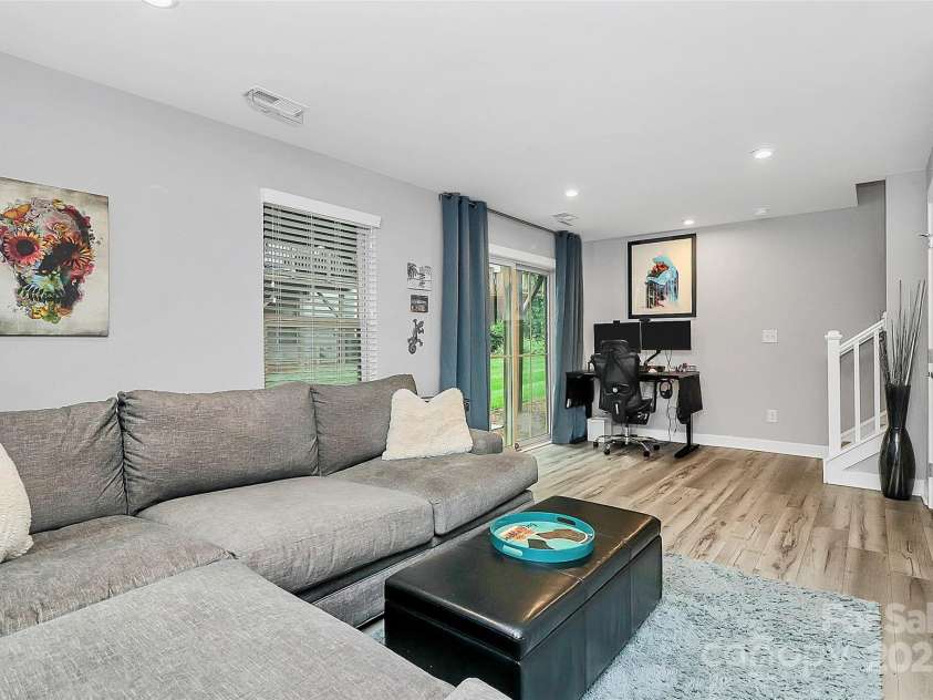 1723 Town Oak Lane, Charlotte, NC 28205.  MLS# CAR4268026, YatesRealty ID 17827. Great room w/extra flex office