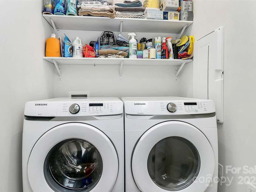 1723 Town Oak Lane, Charlotte, NC 28205.  MLS# CAR4268026, YatesRealty ID 17827. Laundry w/shelving