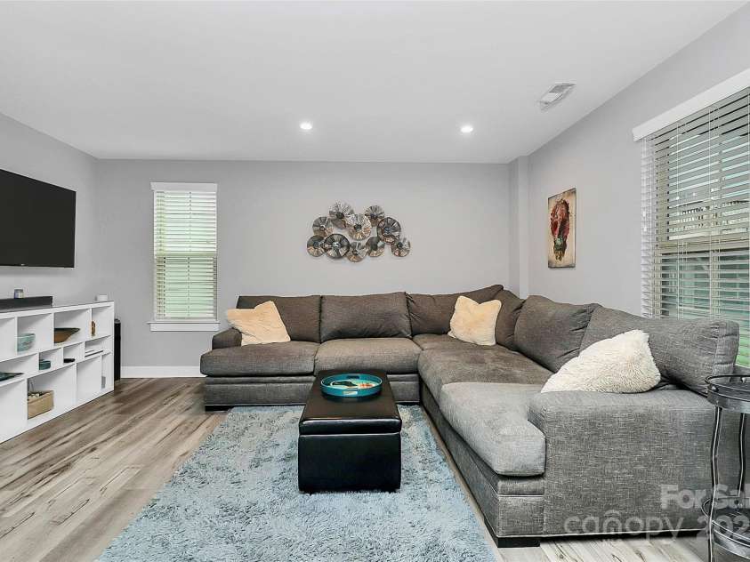 1723 Town Oak Lane, Charlotte, NC 28205.  MLS# CAR4268026, YatesRealty ID 17827. Lower floor great room w/lvp flooring