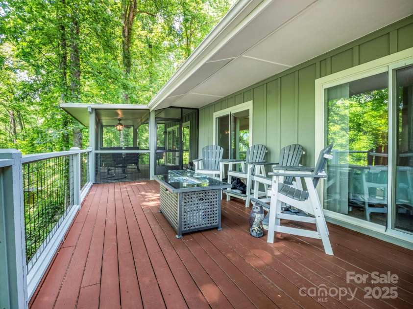 195 White Pine Drive, Lake Lure, NC 28746.  MLS# CAR4266532, YatesRealty ID 17828. Back deck on the main level.
