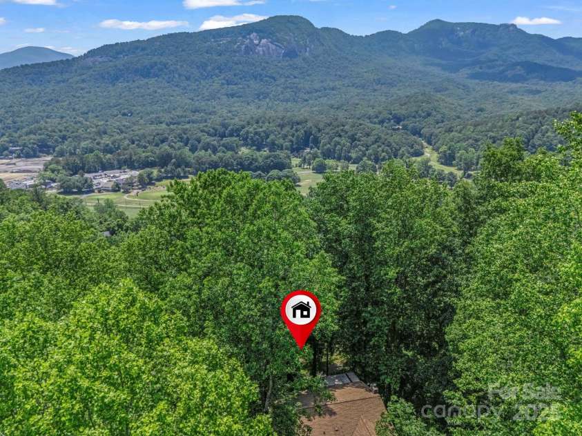 195 White Pine Drive, Lake Lure, NC 28746.  MLS# CAR4266532, YatesRealty ID 17828. Conveniently located within minutes to the community restaurants and amenities.