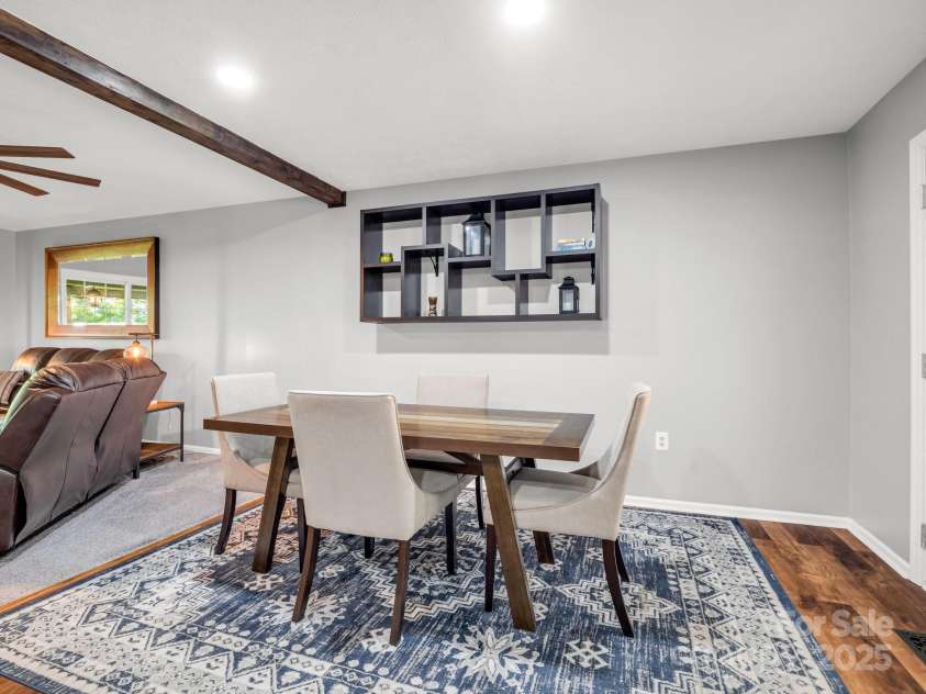 195 White Pine Drive, Lake Lure, NC 28746.  MLS# CAR4266532, YatesRealty ID 17828. Dining area is open to the kitchen and greatroom.