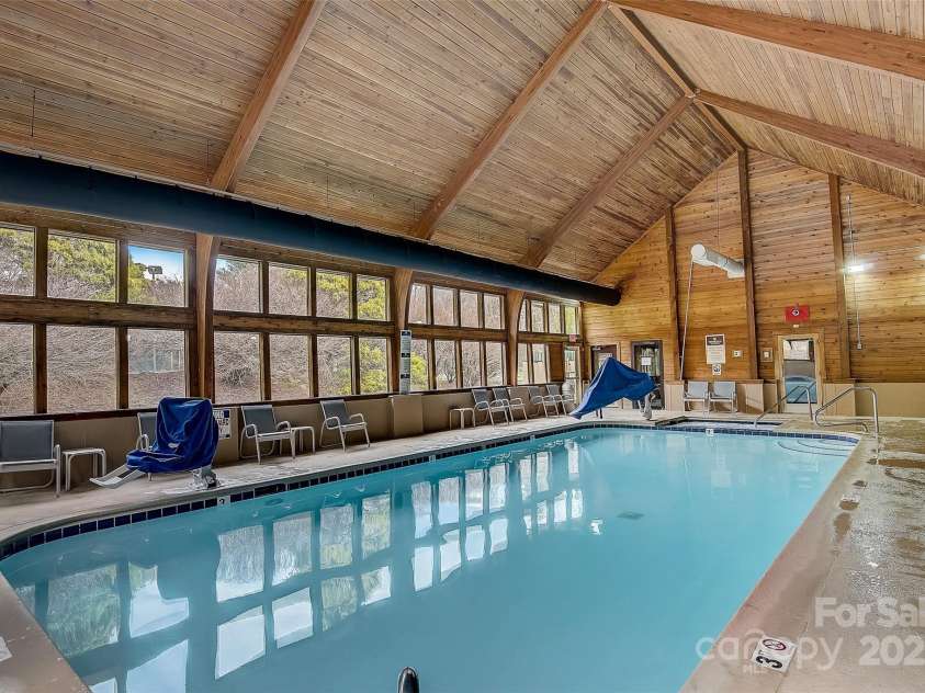 195 White Pine Drive, Lake Lure, NC 28746.  MLS# CAR4266532, YatesRealty ID 17828. Indoor pool, hot tub, sauna, and steam room, located in the wellness center is part of the Rumbling Bald on Lake Lure private amenities.