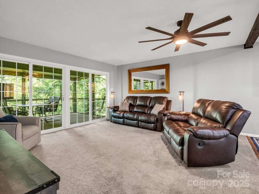 195 White Pine Drive, Lake Lure, NC 28746.  MLS# CAR4266532, YatesRealty ID 17828. Main level open living space.