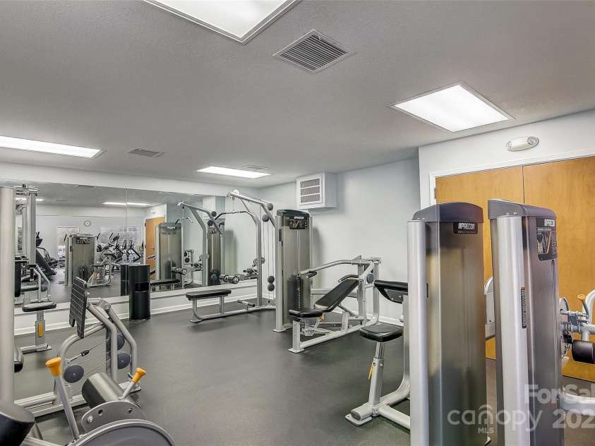 195 White Pine Drive, Lake Lure, NC 28746.  MLS# CAR4266532, YatesRealty ID 17828. Weight room is located in the wellness center at Rumbling Bald on Lake Lure.