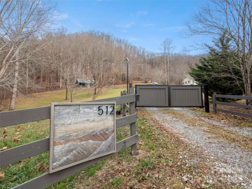 512 Shiloh Drive, Hendersonville, NC 28792.  MLS# CAR4208109, YatesRealty ID 17829. Gated Entry with Custom Sign. 