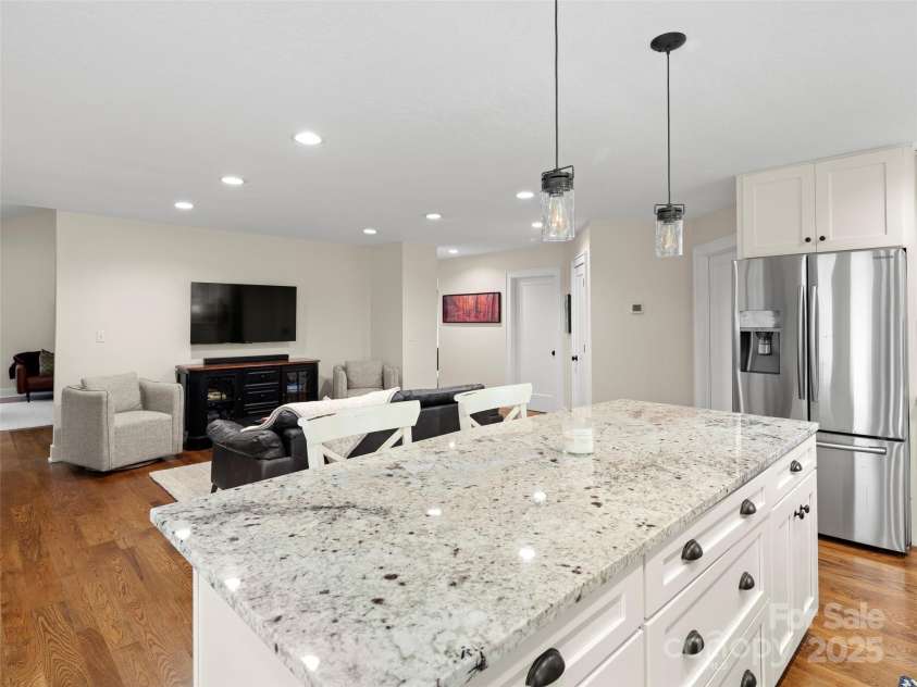 512 Shiloh Drive, Hendersonville, NC 28792.  MLS# CAR4208109, YatesRealty ID 17829. Large kitchen island with seating
