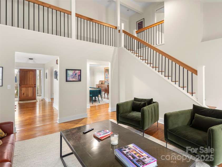 512 Shiloh Drive, Hendersonville, NC 28792.  MLS# CAR4208109, YatesRealty ID 17829. Open stairwell to upper level