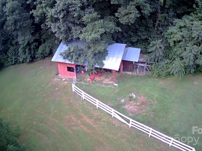 512 Shiloh Drive, Hendersonville, NC 28792.  MLS# CAR4208109, YatesRealty ID 17829. Picture to show when it is summer time and green