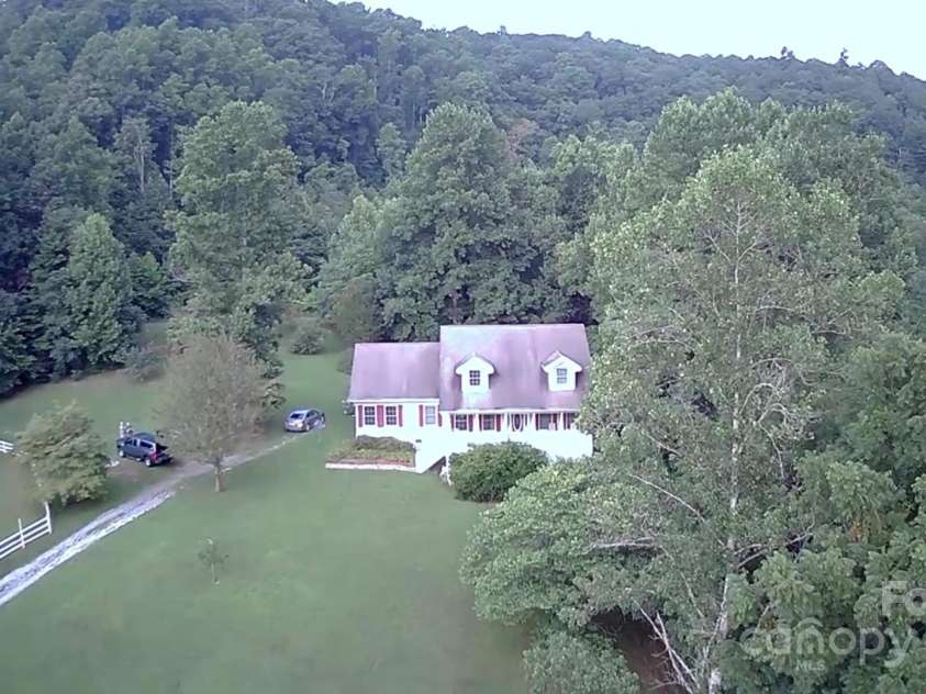 512 Shiloh Drive, Hendersonville, NC 28792.  MLS# CAR4208109, YatesRealty ID 17829. Picture to show when it is summer time and green