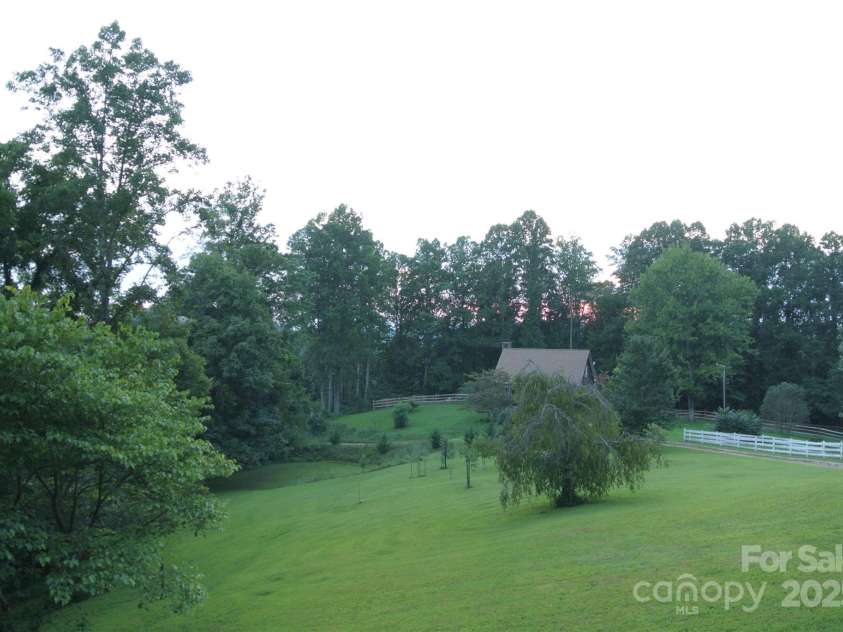 512 Shiloh Drive, Hendersonville, NC 28792.  MLS# CAR4208109, YatesRealty ID 17829. Picture to show when it is summer time and green