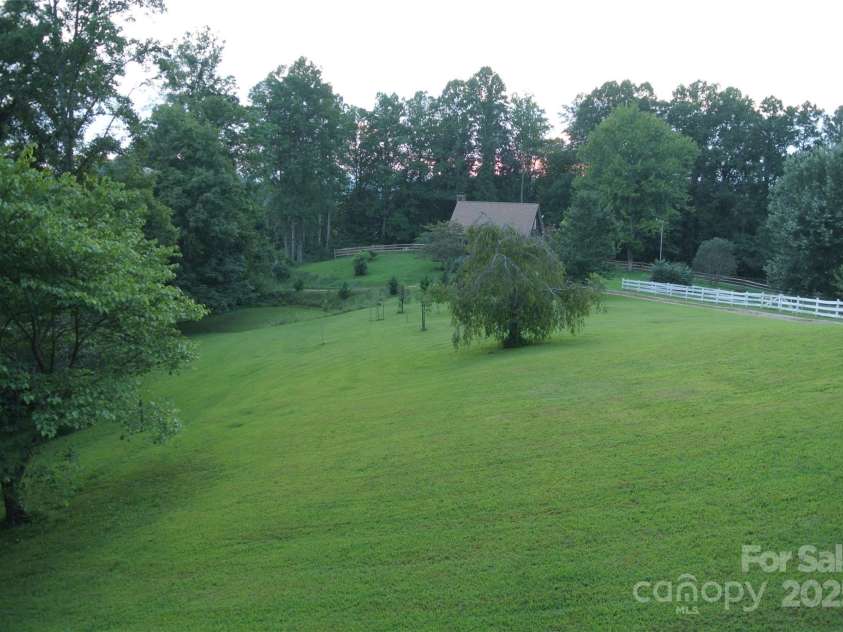 512 Shiloh Drive, Hendersonville, NC 28792.  MLS# CAR4208109, YatesRealty ID 17829. Picture to show when it is summer time and green