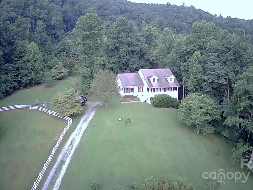 512 Shiloh Drive, Hendersonville, NC 28792.  MLS# CAR4208109, YatesRealty ID 17829. Picture to show when it is summer time and green