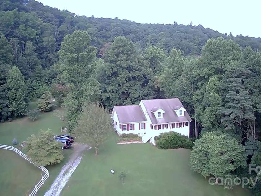 512 Shiloh Drive, Hendersonville, NC 28792.  MLS# CAR4208109, YatesRealty ID 17829. Picture to show when it is summer time and green