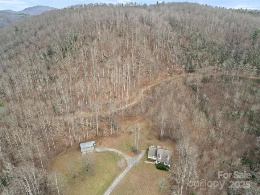 512 Shiloh Drive, Hendersonville, NC 28792.  MLS# CAR4208109, YatesRealty ID 17829. Plenty of outdoor space for gardening, play or relaxation, making it the perfect spot to unwind and enjoy the peaceful surroundings