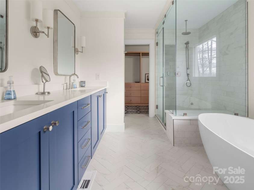 512 Shiloh Drive, Hendersonville, NC 28792.  MLS# CAR4208109, YatesRealty ID 17829. Renovated Primary Bath with heated floors and steam shower