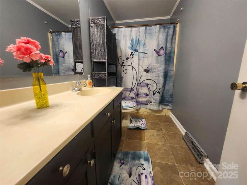 104 Catawba Street, Morganton, NC 28655.  MLS# CAR4233610, YatesRealty ID 17835. 