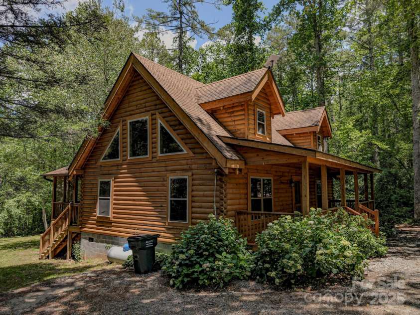 3374 Locust Grove Road, Hendersonville, NC 28792.  MLS# CAR4265087, YatesRealty ID 17837. Left side of house