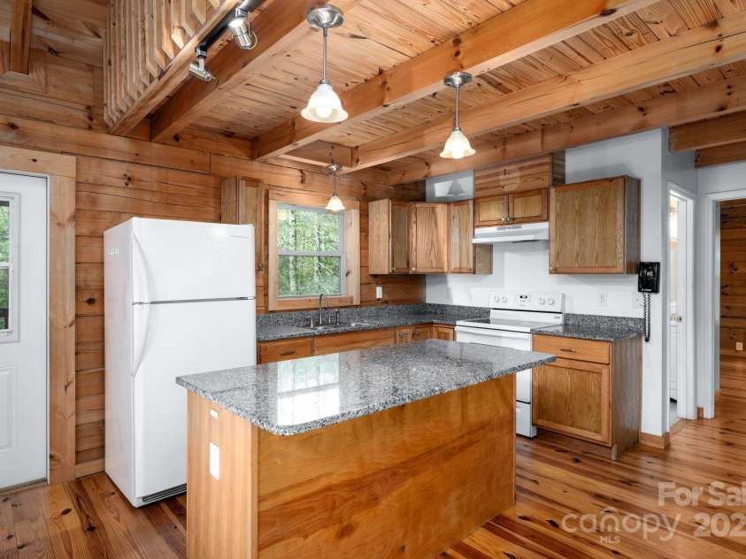 3374 Locust Grove Road, Hendersonville, NC 28792.  MLS# CAR4265087, YatesRealty ID 17837. Open kitchen, dining, and living area