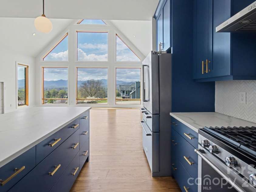 8 Nottingham Drive, Candler, NC 28715.  MLS# CAR4365224, YatesRealty ID 17837. Imagine enjoying this view while cooking