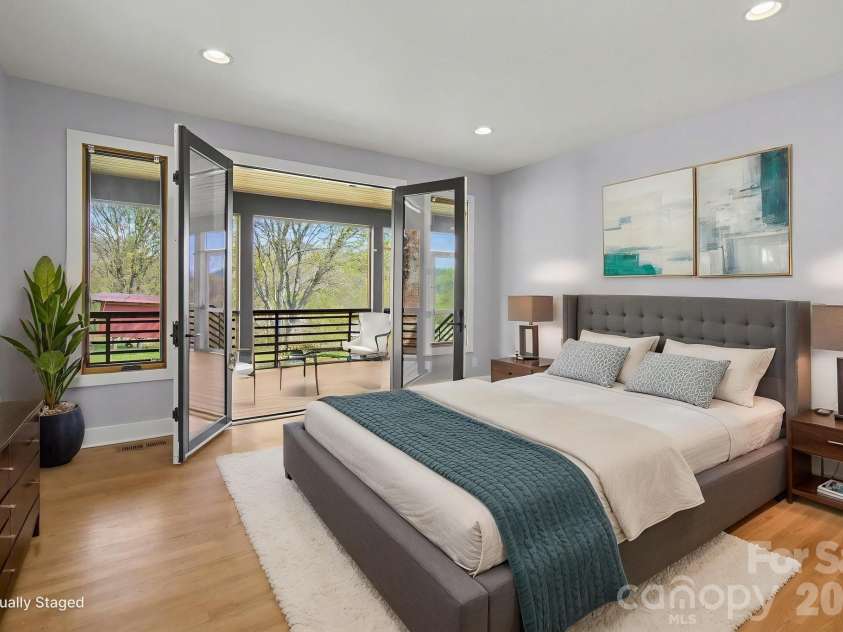 8 Nottingham Drive, Candler, NC 28715.  MLS# CAR4365224, YatesRealty ID 17837. Primary Bedroom virtually staged