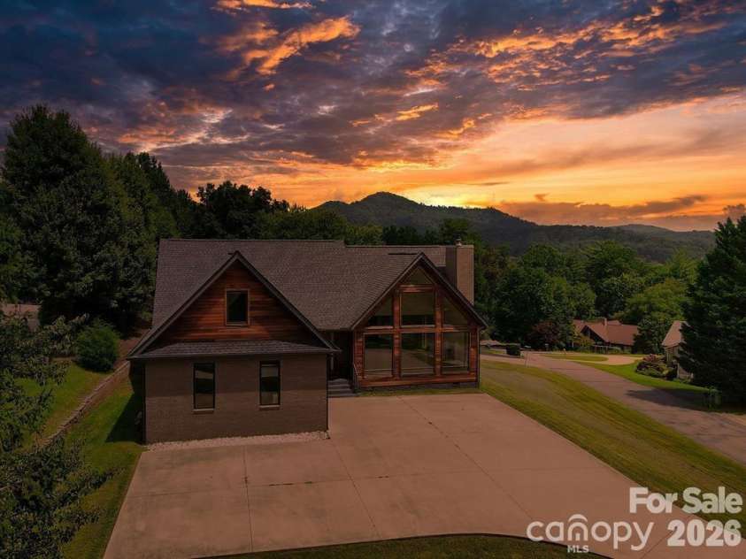 8 Nottingham Drive, Candler, NC 28715.  MLS# CAR4424000, YatesRealty ID 17837. Digital Twilight photo