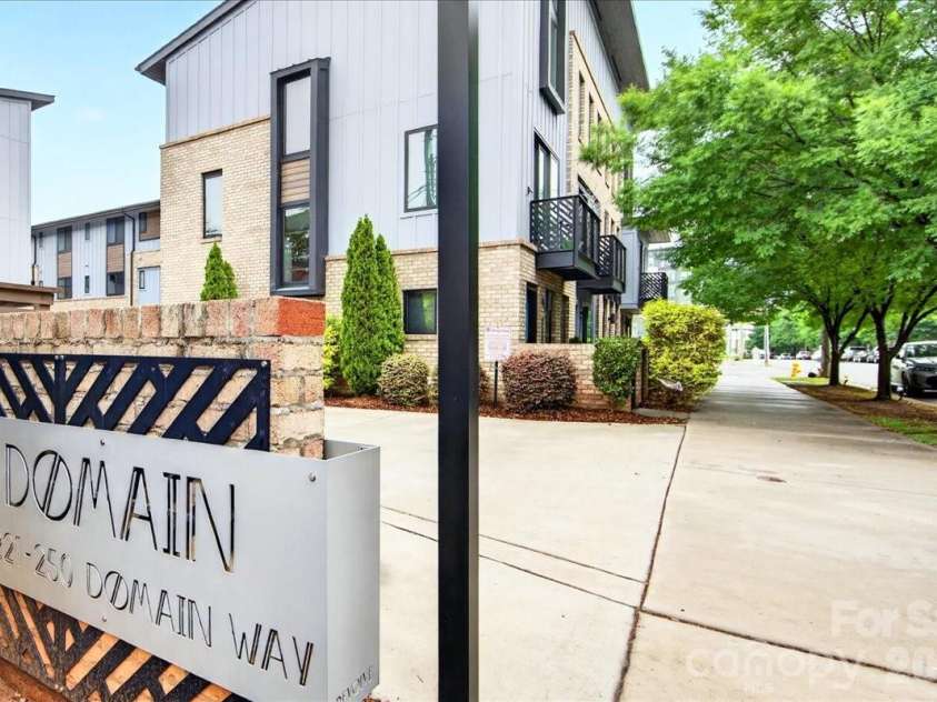 241 Domain Way, Charlotte, NC 28203.  MLS# CAR4374972, YatesRealty ID 17838. Community Entrance