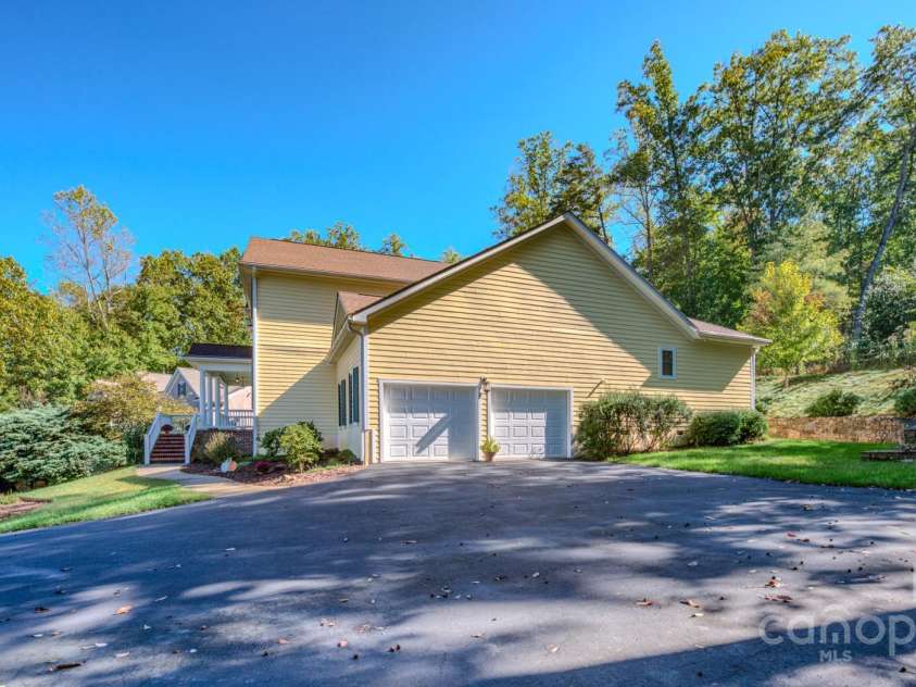 16 La Rue Court, Biltmore Lake, NC 28715.  MLS# CAR4308384, YatesRealty ID 17839. Driveway side