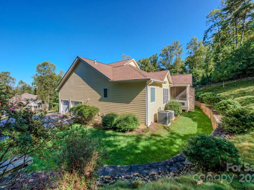 16 La Rue Court, Biltmore Lake, NC 28715.  MLS# CAR4308384, YatesRealty ID 17839. Side of home