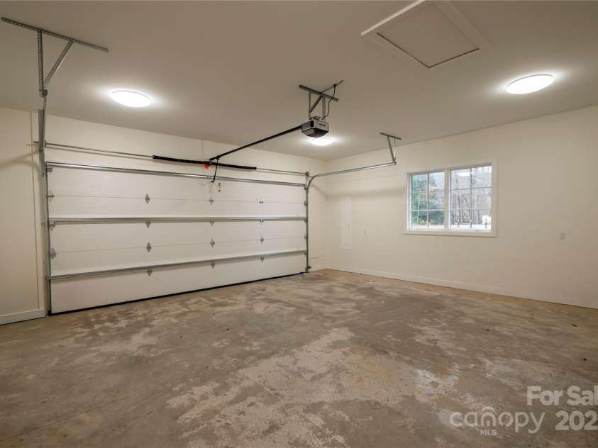 15 Evian Court, Asheville, NC 28804.  MLS# CAR4320178, YatesRealty ID 1784. Garage