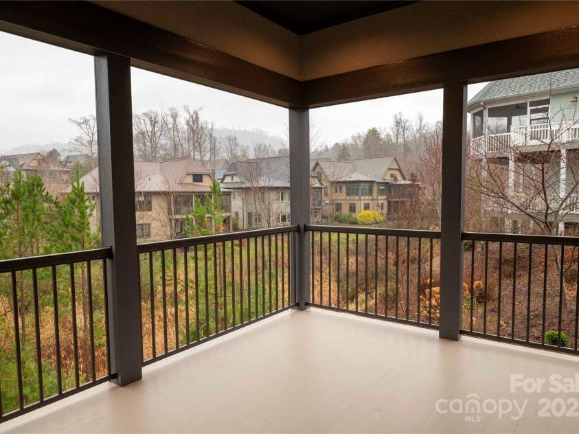 15 Evian Court, Asheville, NC 28804.  MLS# CAR4320178, YatesRealty ID 1784. Lower Level Covered Porch