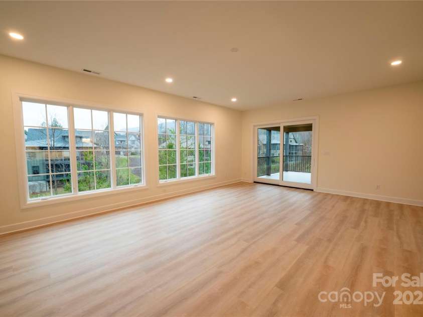 15 Evian Court, Asheville, NC 28804.  MLS# CAR4320178, YatesRealty ID 1784. Lower Level Rec Room