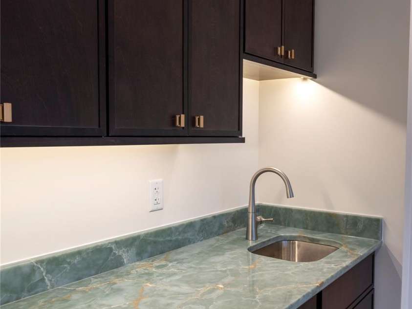 15 Evian Court, Asheville, NC 28804.  MLS# CAR4320178, YatesRealty ID 1784. Lower Level Wet Bar and Beverage Center