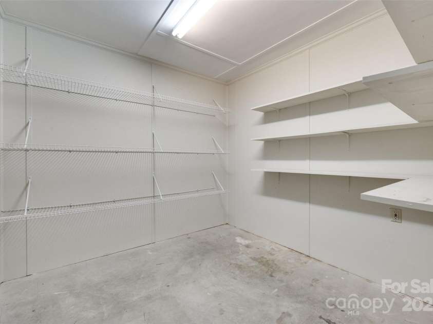 1866 Charter Drive, Rock Hill, SC 29732.  MLS# CAR4256343, YatesRealty ID 17842. Garage storage area