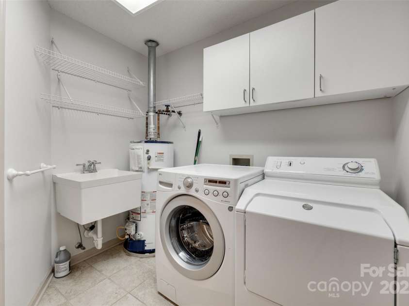 1866 Charter Drive, Rock Hill, SC 29732.  MLS# CAR4256343, YatesRealty ID 17842. Spacious Laundry room with utility sink and built in cabinetry