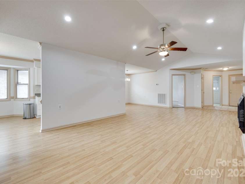 1866 Charter Drive, Rock Hill, SC 29732.  MLS# CAR4256343, YatesRealty ID 17842. View from patio door toward the foyer and dining room. Additional Guest room located at the far end behind dining area.