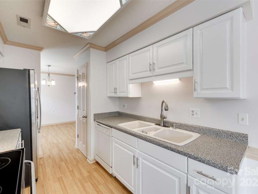 1866 Charter Drive, Rock Hill, SC 29732.  MLS# CAR4256343, YatesRealty ID 17842. View through kitchen from breakfast area toward dining room