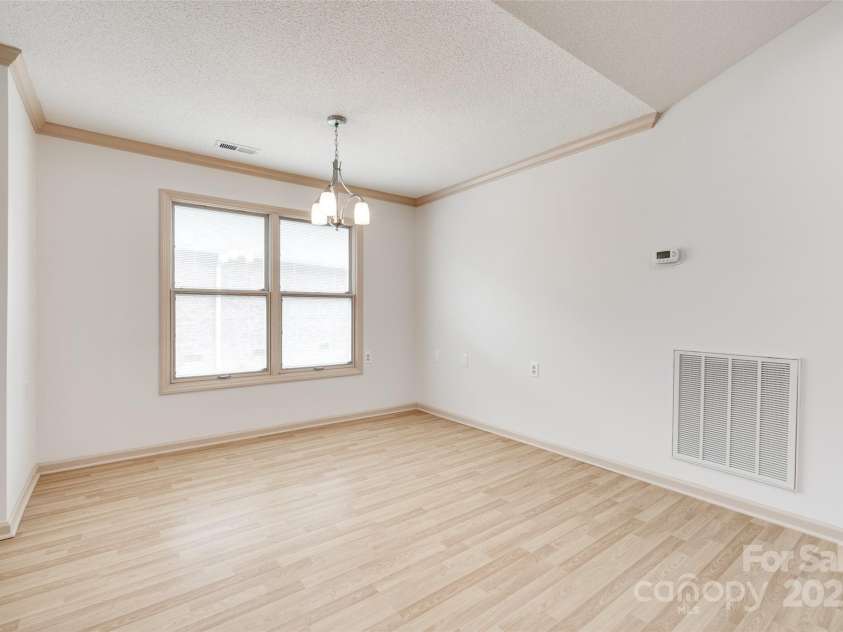 1866 Charter Drive, Rock Hill, SC 29732.  MLS# CAR4256343, YatesRealty ID 17842. Well lighted formal dining area