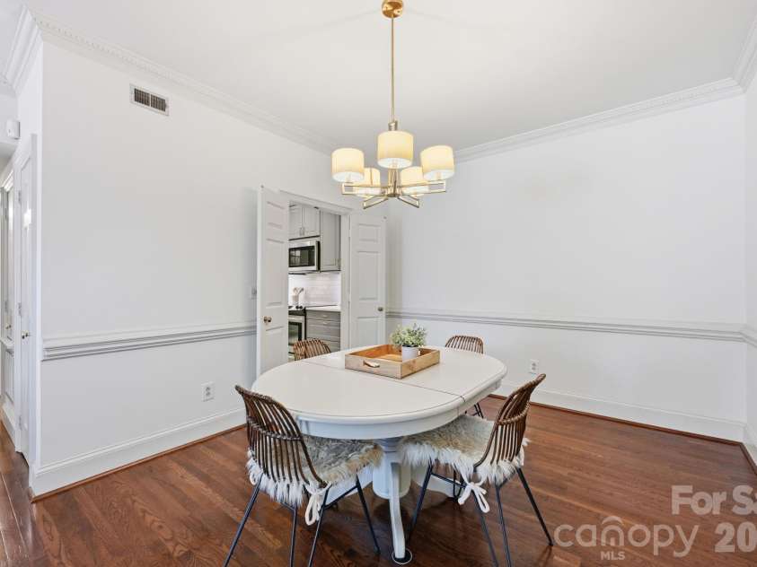 2440 Selwyn Avenue, Charlotte, NC 28209.  MLS# CAR4372591, YatesRealty ID 17843. Dining room or flex space, manually staged.