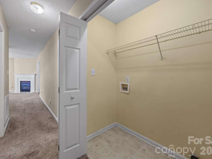 300 Chinaberry Drive, China Grove, NC 28023.  MLS# CAR4346542, YatesRealty ID 1785. Laundry hall closet