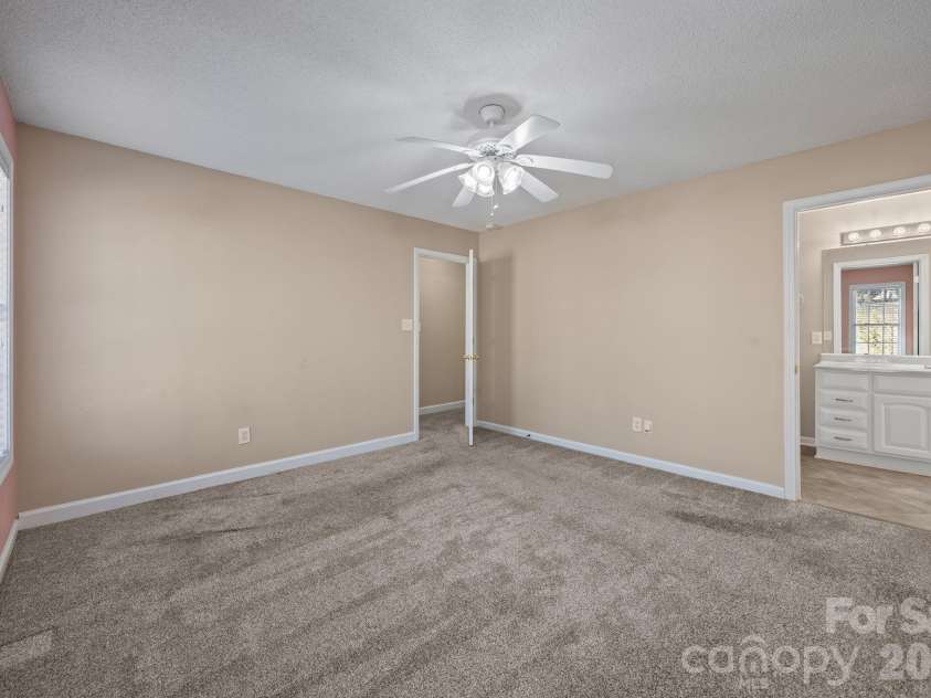 300 Chinaberry Drive, China Grove, NC 28023.  MLS# CAR4346542, YatesRealty ID 1785. Primary bedroom