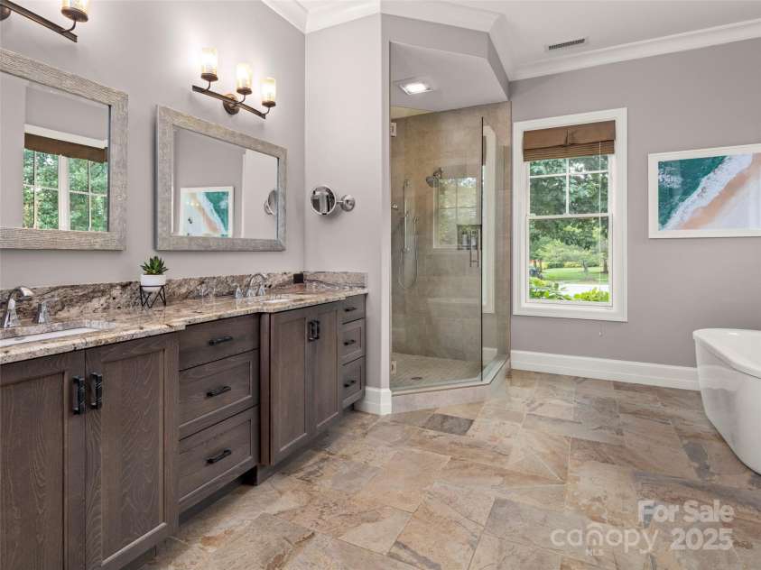 62 Running Creek Trail, Arden, NC 28704.  MLS# CAR4299725, YatesRealty ID 1785. Double vanities with granite counters. 