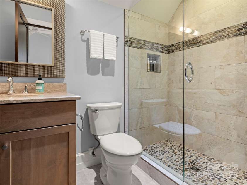 62 Running Creek Trail, Arden, NC 28704.  MLS# CAR4299725, YatesRealty ID 1785. En suite bathroom for second bedroom.