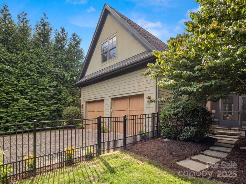 62 Running Creek Trail, Arden, NC 28704.  MLS# CAR4299725, YatesRealty ID 1785. Fence around backyard area.