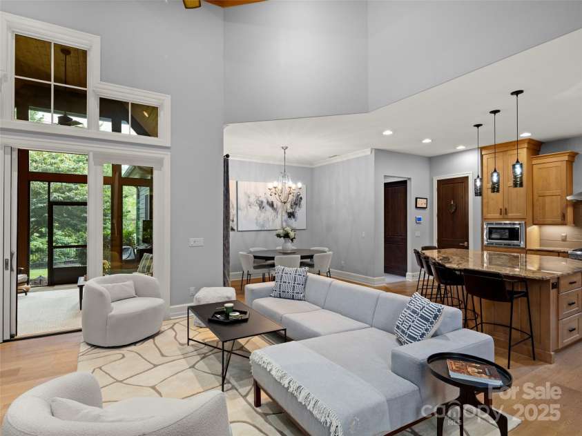 62 Running Creek Trail, Arden, NC 28704.  MLS# CAR4299725, YatesRealty ID 1785. From great room looking into dining area and kitchen