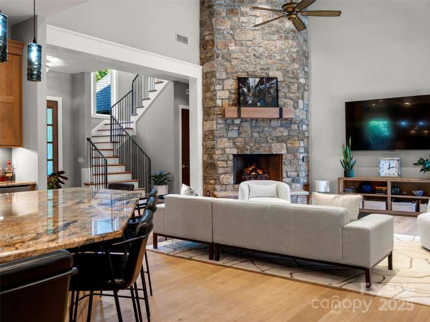 62 Running Creek Trail, Arden, NC 28704.  MLS# CAR4299725, YatesRealty ID 1785. View from back hallway to great room. 