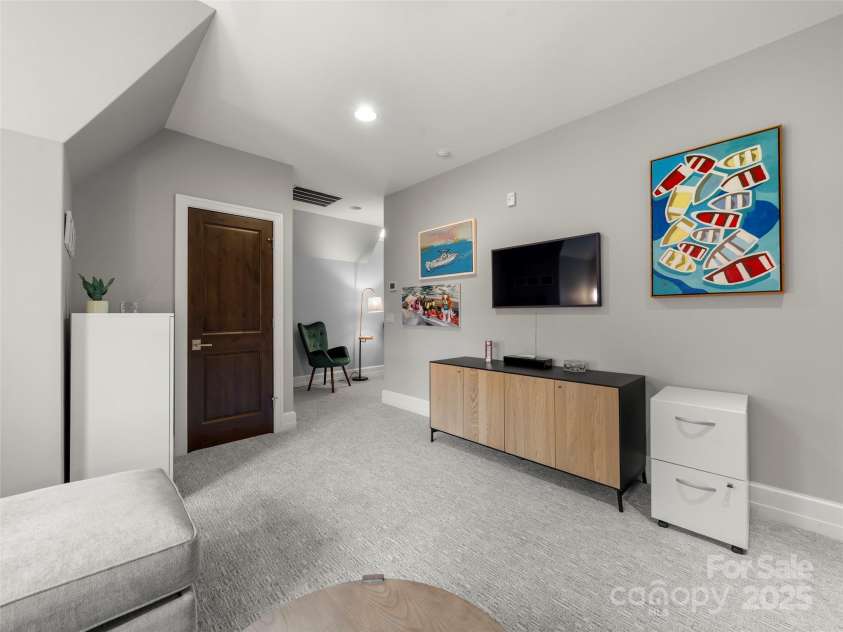 62 Running Creek Trail, Arden, NC 28704.  MLS# CAR4299725, YatesRealty ID 1785. View from upstairs den back to hallway. Door is to storage closet.