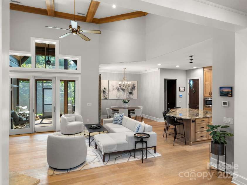 62 Running Creek Trail, Arden, NC 28704.  MLS# CAR4299725, YatesRealty ID 1785. View of great room from the stairs.