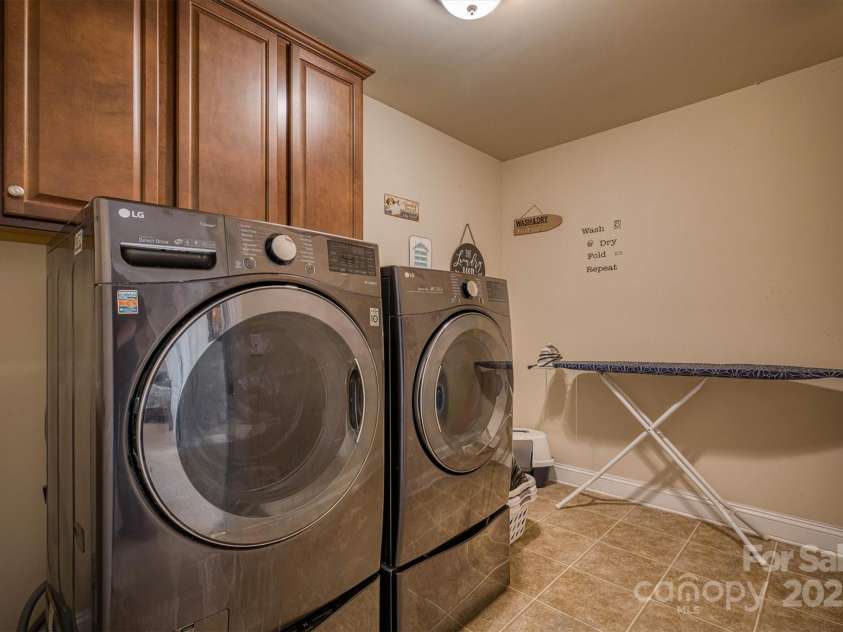139 Autumn Grove Lane, Mooresville, NC 28115.  MLS# CAR4245679, YatesRealty ID 17852. Laundry room upstairs